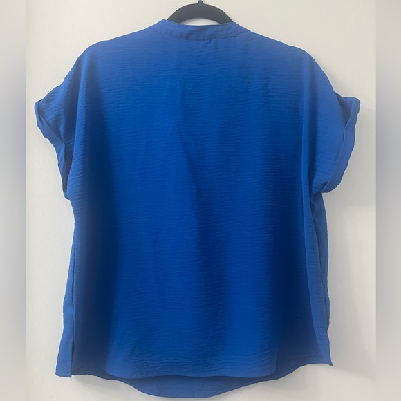 Oversized Blouse in blue from Fashion Nova v-neck t shirt in medium. - Picture 8 of 8